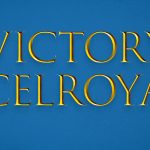 A blue background with all-caps serif gold text that reads "Victory McElroyale"