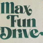 The words “Max Fun Drive” are written in bold, dark green text with swirling serifs. The background is varying shades of green, with layered green swirls criss-crossing to the left and right.